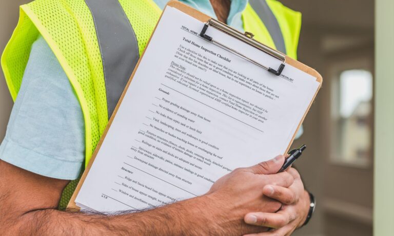 Home inspection in North Idaho with buyer reviewing inspection results